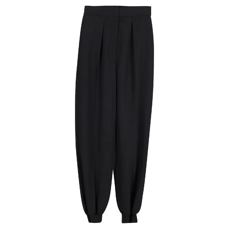 Stella McCartney Pleated Tapered Trousers in Black Wool